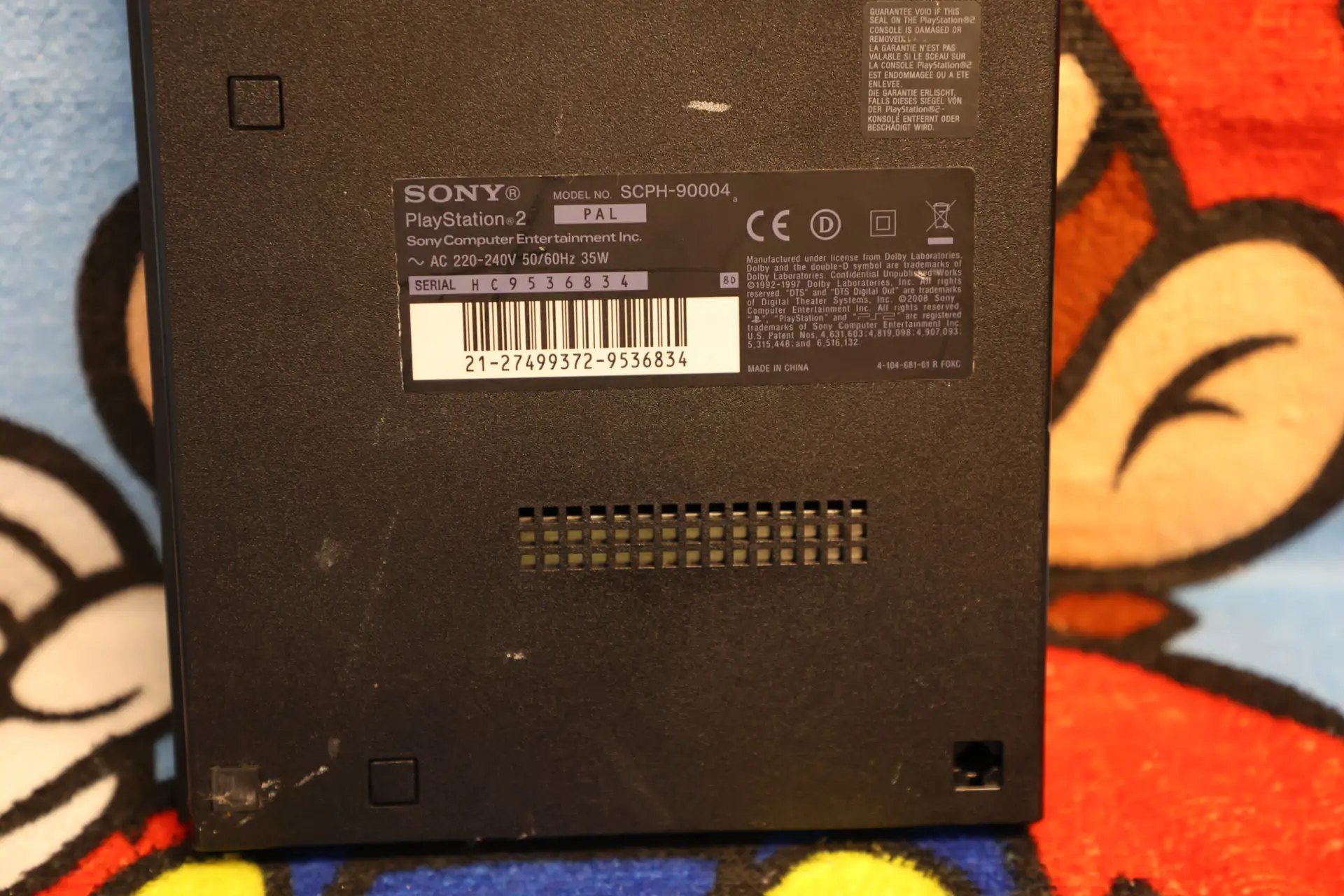 1633, 1569, 1077 - Playstation 2 Slim mit Controller